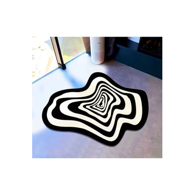 Tapis décoratif décoratif moderne noir et blanc à base tissée asymétrique