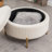 Mariantonietta Upholstered Round Storage Ottoman-1855773758