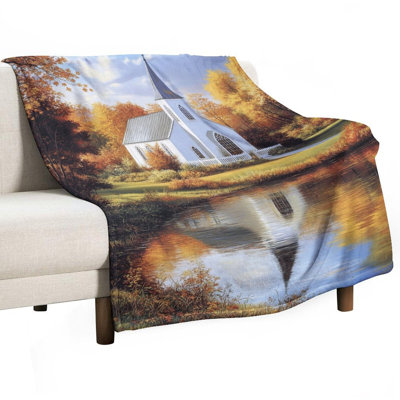 Jeté d'automne en flanelle de luxe reflétée dans un étang, couverture douce et chaude pour le canapé-lit du salon