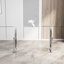 Console avec pieds en acier inoxydable et plateau en verre - Design moderne pour espace de vie et transparence