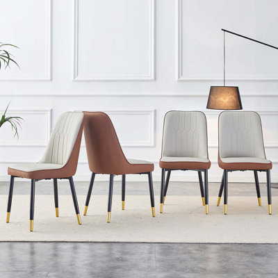 Une chaise de salle à manger moderne avec dossier en cuir PU et pieds en métal, idéale pour les cuisines, les chambres et les bureaux