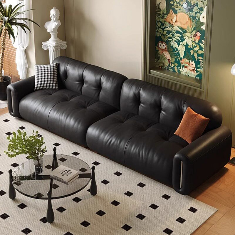 Causeuse-coussin modulable noire en cuir véritable