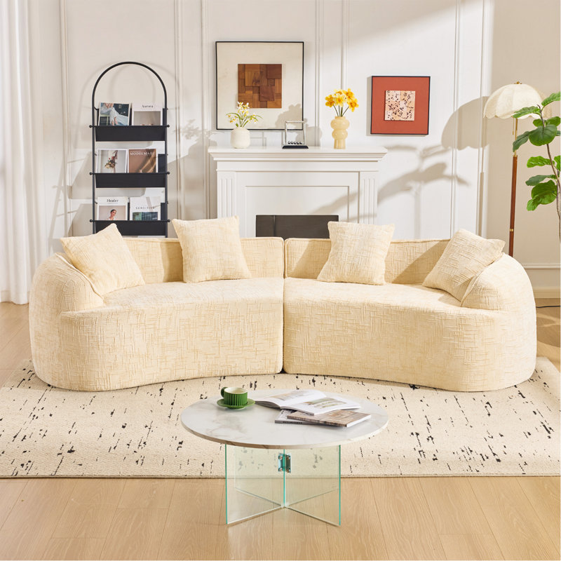 Canapé beige courbé et compressé, conception créative de style nordique pour le salon, confortable, doux et adapté à de multiples cas de figure