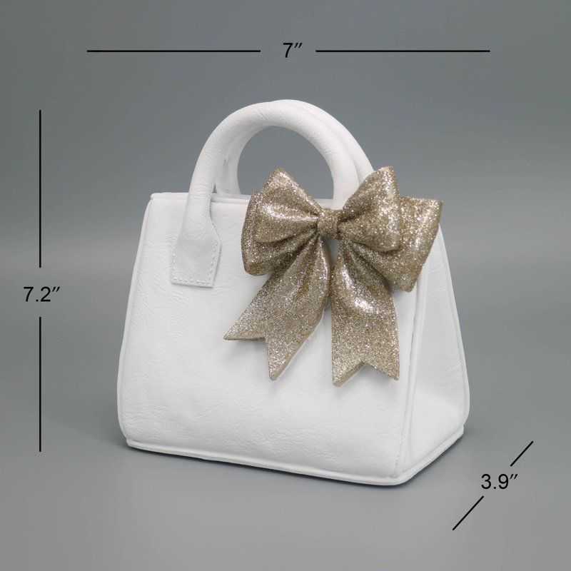 Sac à main en résine blanc mat avec texture en cuir et nœud à paillettes dorées et objets décoratifs et décoration intérieure