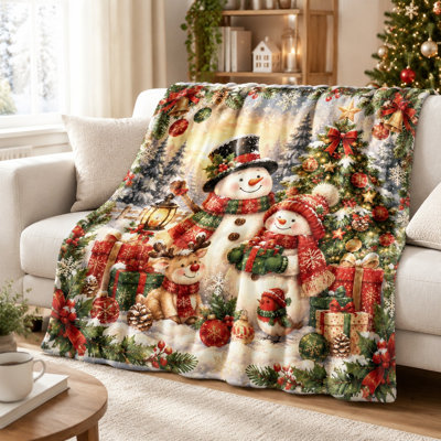 Couverture polaire douce et chaude à motif bonhomme de neige et cerf, idéale pour le canapé, le lit et la décoration festive des fêtes de fin d'année.