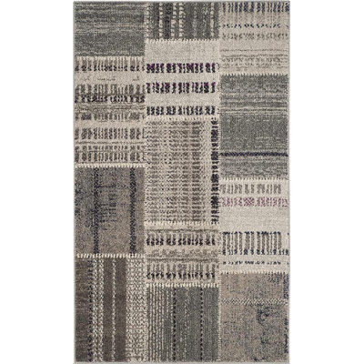 Tapis gris à motif géométrique Tucker