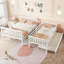 Lit simple au-dessus d'un lit double en bois avec lit gigogne-1258164883