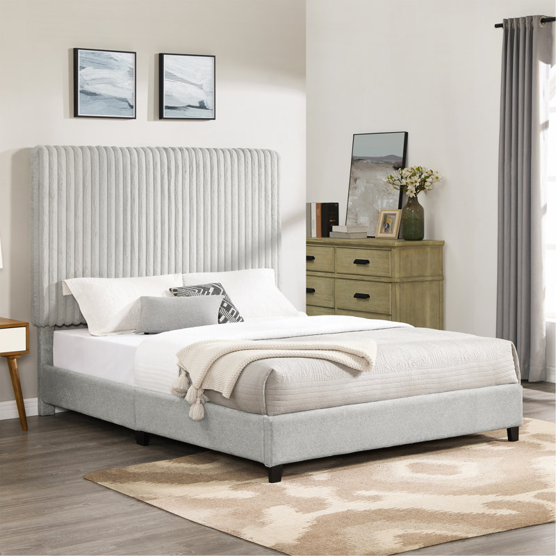 Grand lit plateforme tapissier en pierre Minky
