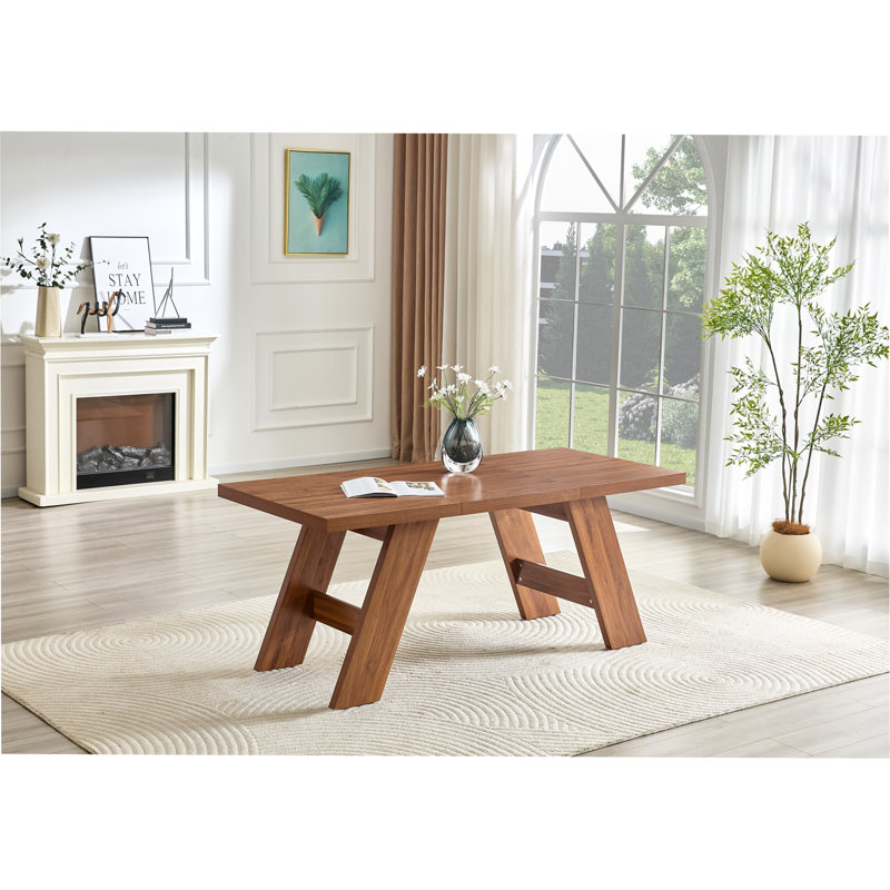 Table de salle à manger rectangulaire en bois aggloméré de 71 po x 31,5 po avec pieds en bois de noyer épissé. Pieds de table doubles inclinés vers l'extérieur.