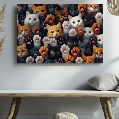 Toile Un arrangement vibrant et ludique de nombreuses pattes de chat et de visages d'art mural remplit le cadre présentant une variété de couleurs de fourrure
