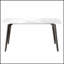 Table de salle à manger moderne en pierre artificielle avec bord incurvé et pieds en métal gris foncé pouvant accueillir 6 personnes