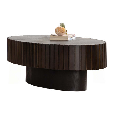 Oval Wooden Coffee Table with Handcrafted Relief and Sturdy Pedestal for Living Room