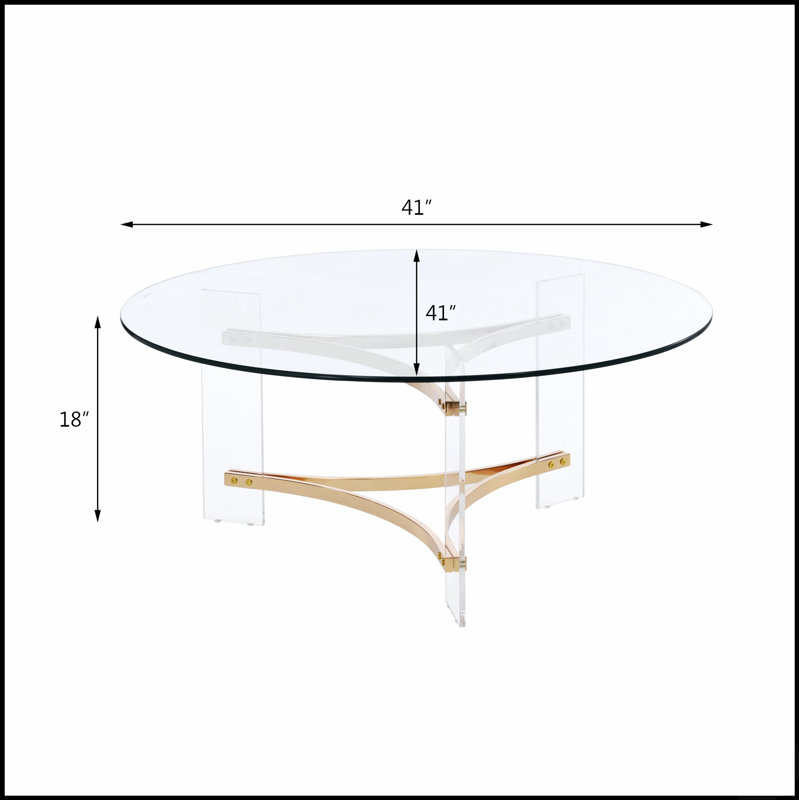 Table basse Sosi au fini or avec plateau en verre trempé et structure métallique robuste, idéale pour les intérieurs modernes.