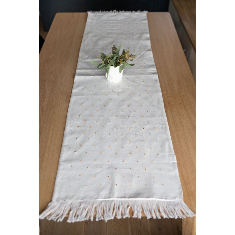 Chemin de table brodé à pois jaunes