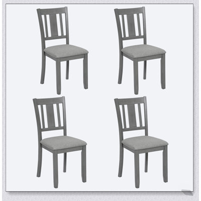 Ensemble de chaises de salle à manger élégantes et rembourrées grises pour 4 personnes, combinant confort et style pour toute salle à manger.