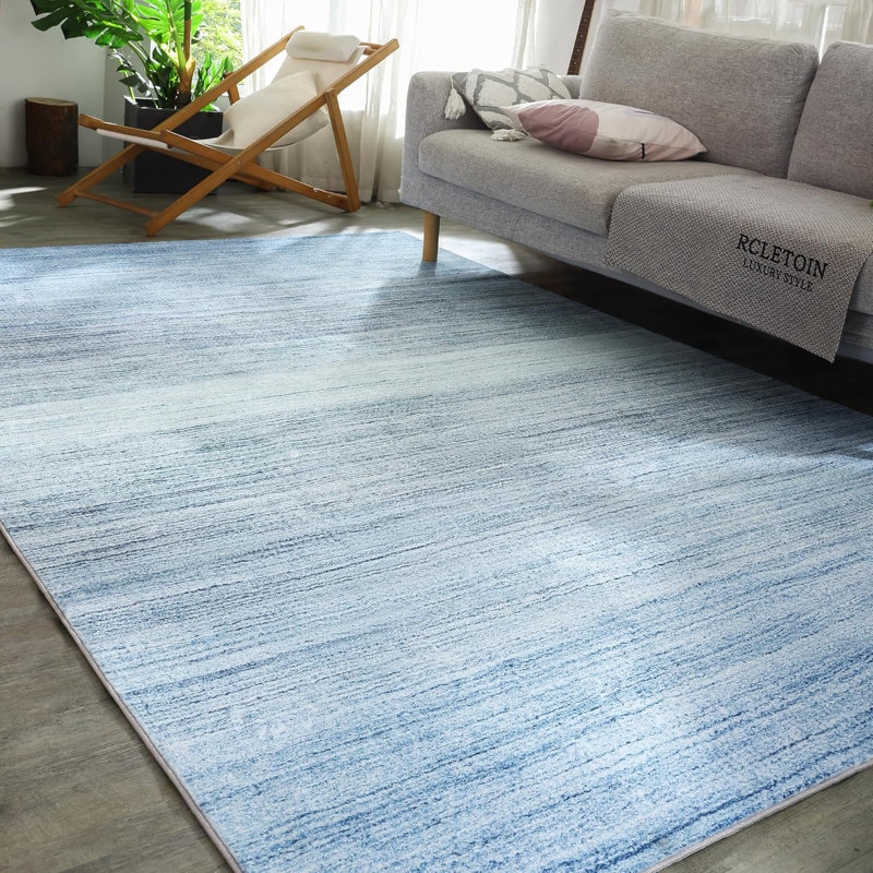 Salon, chambre à coucher, dortoir avec tapis bleu