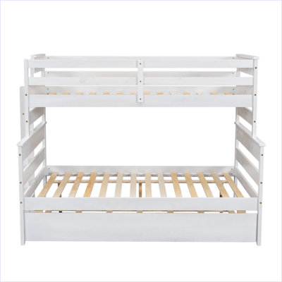 Lit superposé simple au-dessus d'un lit double avec lit gigogne en bois
