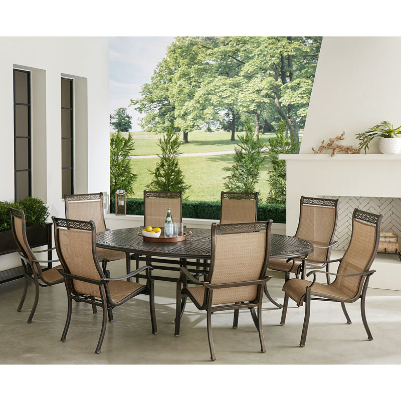 Mikequan 8 - Person Oval Outdoor Dining Set with Cushions