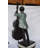 Boy playing cello large bronze statue -  Size: 19"L x 22"W x 59"H.