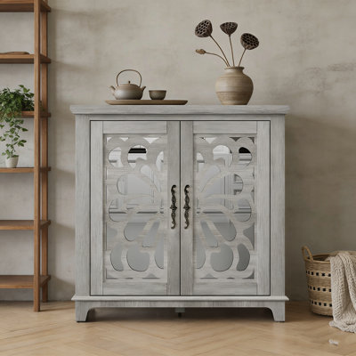 Elegant Sideboard with Mirrored Doors, Adjustable Shelf, and Hollow-Carved Accents for Versatile Storage and Stylish Display.