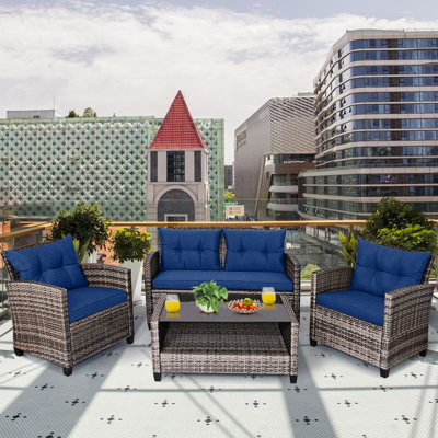 Marena Wicker 4 - Person Outdoor Seating Group with Cushions
