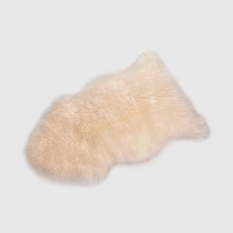Tapis beige en peau de mouton Isilda