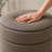 Stylish Linen Cylinder Storage Ottoman-1121326580