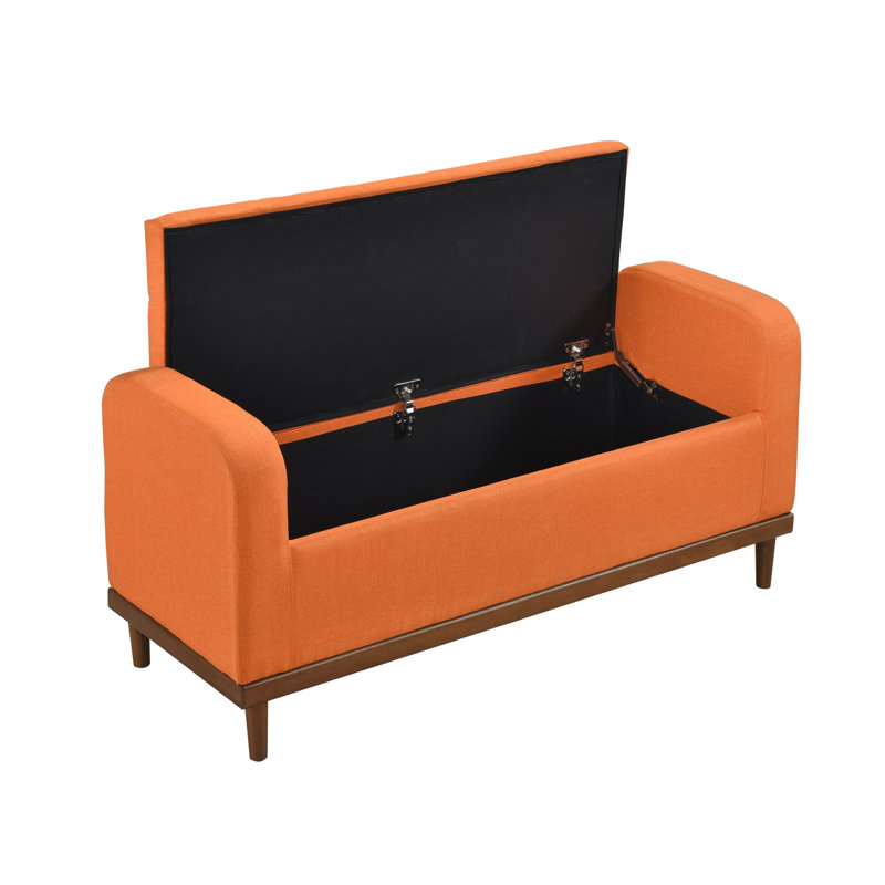 Banc de rangement relevable de style moderne du milieu du siècle, avec revêtement capitonné orange et finition en bois de noyer