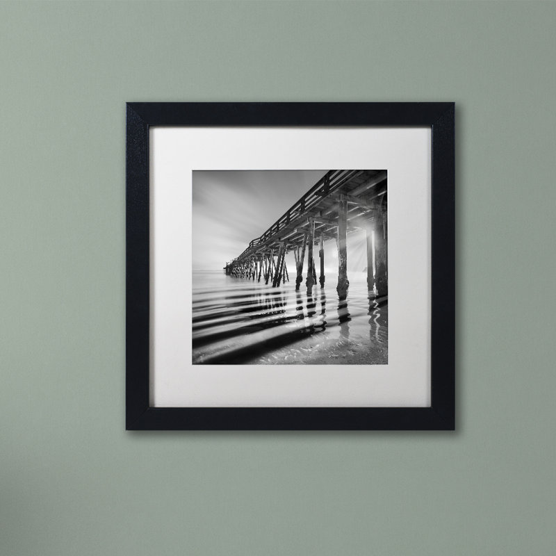 " Pier And Shadows " by Moises Levy, 11" H x 11" W x 0.5" D, Black Framed