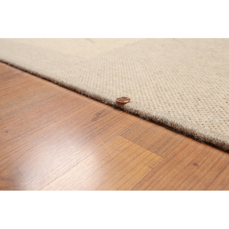 Tapis à aire beige en laine Davies