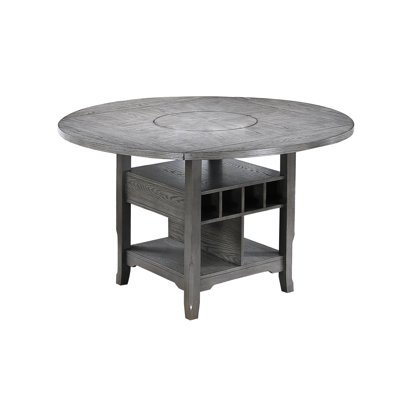 Table transitionnelle grise à hauteur de comptoir avec compartiments ouverts et paresseux intégrés pour les dîners de famille