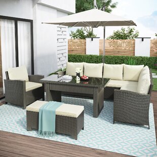 https://assets.wfcdn.com/im/46734084/resize-h310-w310%5Ecompr-r85/1868/186849540/endsley-8-person-rectangular-outdoor-dining-set-with-cushions.jpg