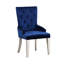 Fauteuil capitonné bleu à boutons - Siège incliné et anneau de traction au dossier pour un repas de luxe
