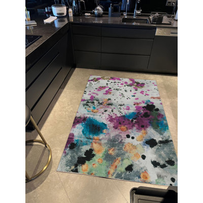 Tapis tissé multicolore à thème peint