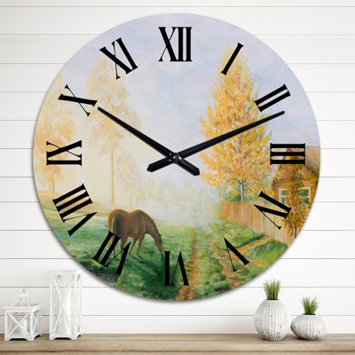 Horloge murale dans un paysage champêtre