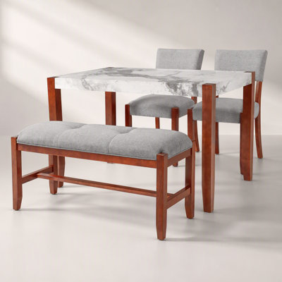 Ensemble de salle à manger 4 pièces avec table en faux marbre, chaises rembourrées et banc, pieds en bois d'hévéa massif, conception peu encombrante, gris