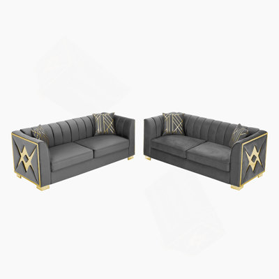 Velvet Button-Tufted Three-Seater Sofa With Gold Stainless Steel Accents, Luxurious Comfort And Timeless Chesterfield Design For Living Spaces.