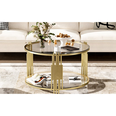 Table basse 31,5 po asymétrique en métal, plateau en verre transparent, base tambour doré avec tablette supplémentaire à des fins fonctionnelles et décoratives, table trempée moderne de 31,5 po, base en métal, rangement inférieur