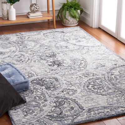 Tapis géométrique ivoire / gris en laine / coton touffeté à la main Bathilde