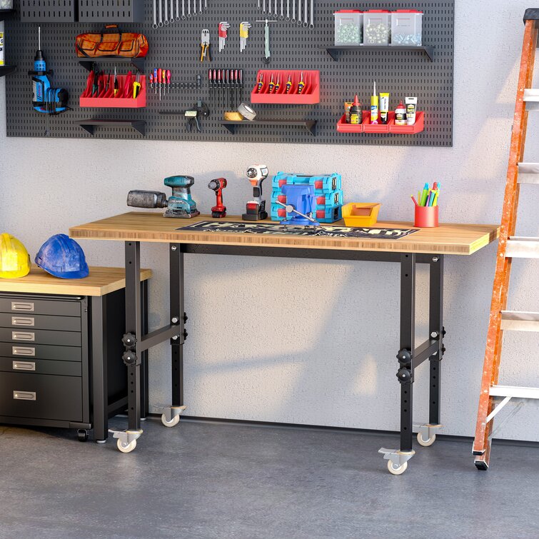 https://assets.wfcdn.com/im/46772835/resize-h755-w755%5Ecompr-r85/1535/153528099/Mae+Wood+Top+Height-Adjustable+Workbench+with+Wheels.jpg