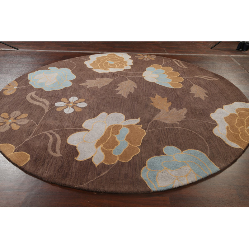 Tapis rond brun en laine touffeté à la main