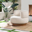 Carmer Upholstered Swivel Armchair