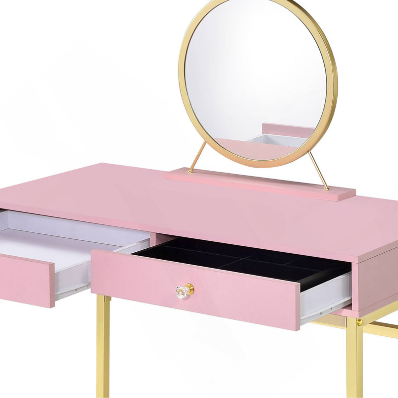 Bureau de meuble-lavabo rose et doré avec miroir et plateau à bijoux