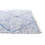 Tapis bleu Kalmanovitz