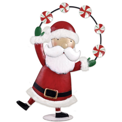 Sculpture de père Noël qui jongle avec des bonbons