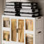 Grande armoire de rangement portative avec 8 petites armoires de rangement et 2 tringles de suspension pour les articles. 12, tringles, portes magnétiques. Pour les vêtements, les articles. Pp et abdos forts Rapide à assembler. Blanc