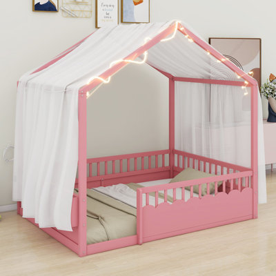 Lit Montessori avec garde-corps et porte pour les chambres d'enfants ludiques et douillettes