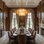 9-Light 32"W Polished Brass Modern Tired Chandelier With Hand-Blown Glass For Dining Room Or Living Room