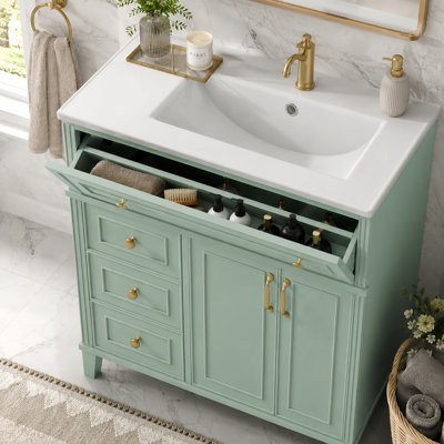 Meuble-lavabo moderne sur pied 36 po avec lavabo et tiroirs en céramique