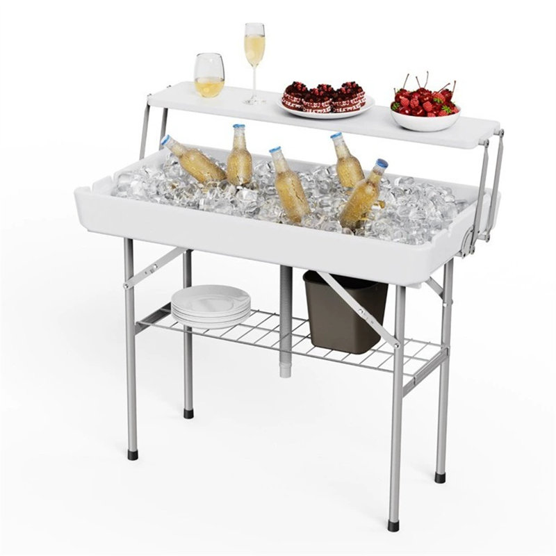 Table pliante extérieure avec refroidisseur de glace avec drain, tables de glace à deux niveaux avec jupe amovible et tablette de rangement supplémentaire, utilisation intérieure extérieure pour événements, fêtes, mariage, camping, barbecue, blanc